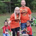 Cannon Hinnant's Family with two children receiving new bikes